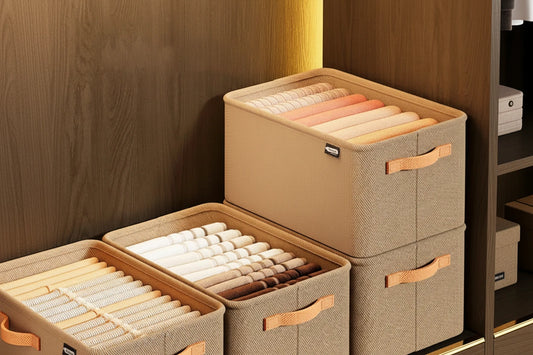 Beige storage boxes with handles on a wooden surface